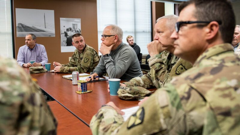 Minnesota Gov. Tim Walz meets with National Guard officers and local authorities on about damage caused by a winter storm in Austin, Minnesota. April 13, 2019. Minnesota Gov. Tim Walz meets with National Guard officers and local authorities on about damage caused by a winter storm in Austin, Minnesota. April 13, 2019. | Minnesota National Guard photo by Sgt. Sebastian Nemec